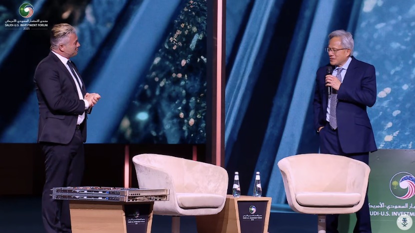 Jensen Huang and Tarek Amin on stage announcing the deal